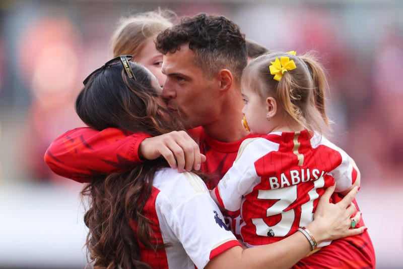 LONDON, ENGLAND - MAY 28: Granit Xhaka of Arsenal embraces his family following the Premier League match between Arsenal FC and Wolverhampton Wanderers at Emirates Stadium on May 28, 2023 in London, England. (Photo by Catherine Ivill/Getty Images)