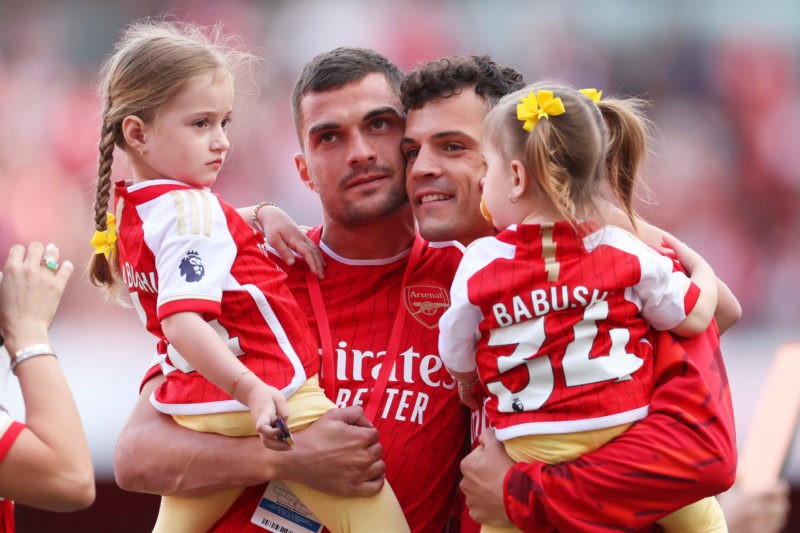 LONDON, ENGLAND - MAY 28: Granit Xhaka of Arsenal (R) and brother Taulant Xhaka (L) interact after the Premier League match between Arsenal FC and Wolverhampton Wanderers at Emirates Stadium on May 28, 2023 in London, England. (Photo by Catherine Ivill/Getty Images)