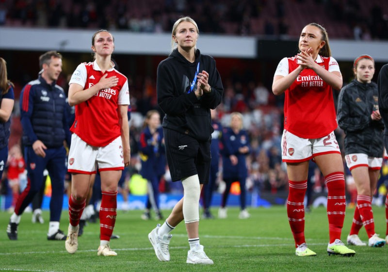 LONDON, ENGLAND - MAY 01: Leah Williamson of Arsenal, wearing a knee support for their ACL injury, acknowledges the fans as they walk with players of Arsenal after their side's defeat to VfL Wolfsburg during the UEFA Women's Champions League semi-final 2nd leg match between Arsenal and VfL Wolfsburg at Emirates Stadium on May 01, 2023 in London, England. (Photo by Clive Rose/Getty Images)