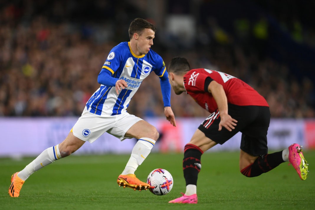 BRIGHTON, ENGLAND - MAY 04: Solly March of Brighton & Hove Albion gets past Diogo Dalot of Manchester United during the Premier League match between Brighton & Hove Albion and Manchester United at American Express Community Stadium on May 04, 2023 in Brighton, England. (Photo by Mike Hewitt/Getty Images)