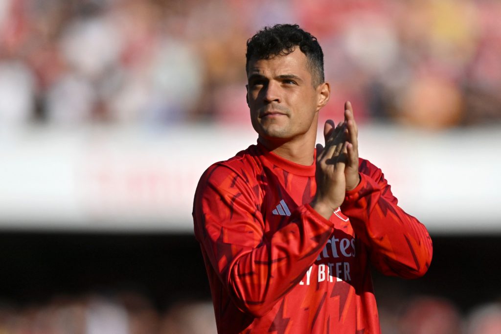 Arsenal news and gossip - Arsenal's Swiss midfielder Granit Xhaka acknowledges supporters at the end of the English Premier League football match between Arsenal and Wolverhampton Wanderers at the Emirates Stadium in London on May 28, 2023. (Photo by GLYN KIRK/AFP via Getty Images)