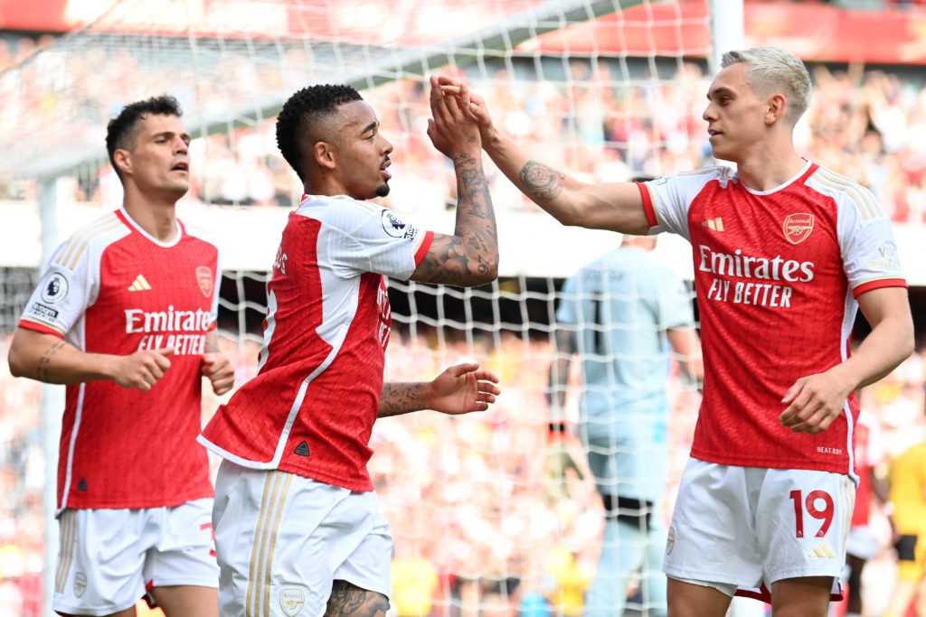 Arsenal's Brazilian striker Gabriel Jesus (C) celebrates with Arsenal's Belgian midfielder Leandro Trossard (R) and Arsenal's Swiss midfielder Granit Xhaka after scoring his team's fourth goal during the English Premier League football match between Arsenal and Wolverhampton Wanderers at the Emirates Stadium in London on May 28, 2023.(Photo by GLYN KIRK/AFP via Getty Images)