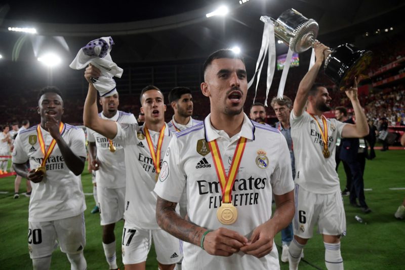 Real Madrid's Spanish midfielder Dani Ceballos (C) and teammates celebrate with the trophy after winning the Spanish Copa del Rey (King's Cup) final football match between Real Madrid CF and CA Osasuna at La Cartuja stadium in Seville on May 6, 2023. (Photo by CRISTINA QUICLER / AFP) (Photo by CRISTINA QUICLER/AFP via Getty Images)