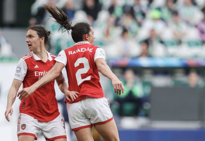 Arsenal's Brazilian defender Rafaelle Souza (R) celebrates scoring her teams first goal with Arsenals English defender Lotte Wubben-Moyduring the UEFA Women's Champions League semi-final first-leg match between VFL Wolfsburg and Arsenal in Wolfsburg, northern Germany, on April 23, 2023. (Photo by Ronny Hartmann / AFP) (Photo by RONNY HARTMANN/AFP via Getty Images)