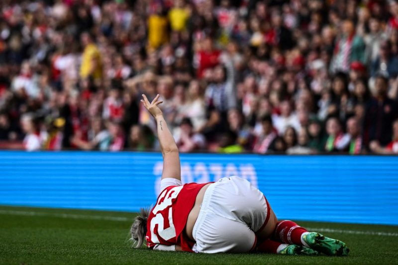 Arsenal's Austria defender Laura Wienroither reacts and lays down following an injury during the UEFA Women's Champions League semi-final second-leg match between Arsenal and Wolfsburg at the Arsenal Stadium, in London, on May 1, 2023. (Photo by Ben Stansall / AFP) (Photo by BEN STANSALL/AFP via Getty Images)