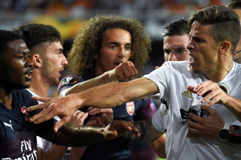 Valencia's Brazilian defender Gabriel Paulista (R) argues with Arsenal's players during the UEFA Europa League semi-final second leg football match between Valencia CF and Arsenal FC at the Mestalla stadium in Valencia on May 9, 2019. (Photo credit should read JOSE JORDAN/AFP via Getty Images)
