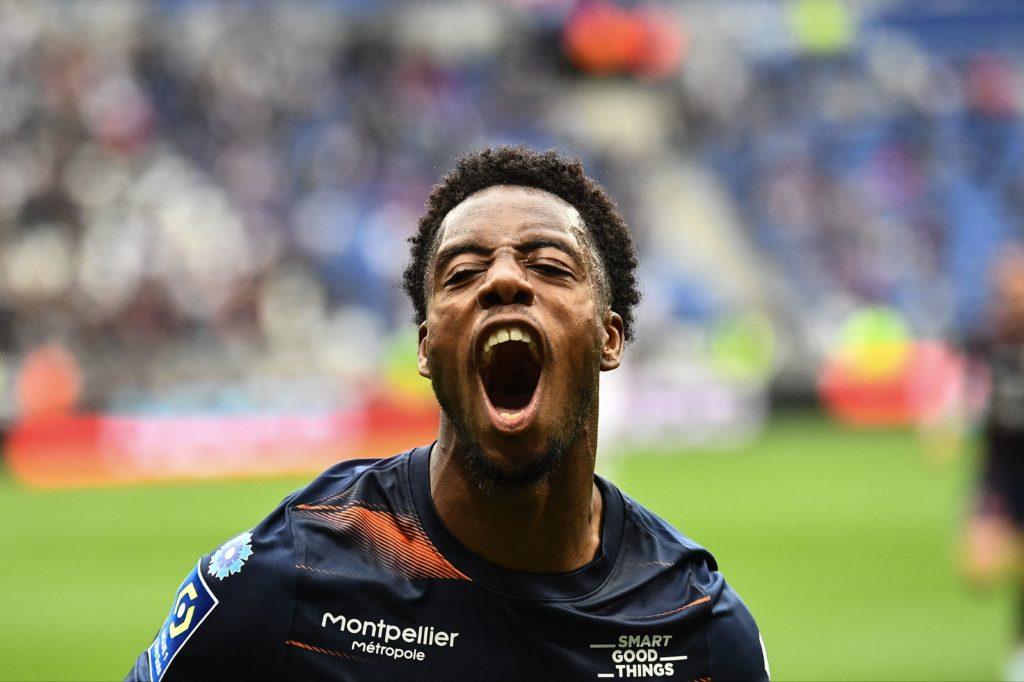 Montpellier's French forward Elye Wahi celebrates scoring his team's first goal during the French L1 football match between Olympique Lyonnais (OL) and Montpellier Herault SC at The Groupama Stadium in Decines-Charpieu, central-eastern France on May 7, 2023. (Photo by OLIVIER CHASSIGNOLE/AFP via Getty Images)