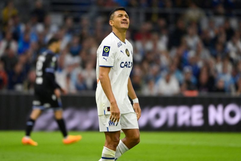 Marseille's Chilean forward Alexis Sanchez celebrates after scoring his team's second goal during the French L1 football match between Olympique Marseille (OM) and AJ Auxerre at Stade Velodrome in Marseille, southern France on April 30, 2023. (Photo by CLEMENT MAHOUDEAU / AFP) (Photo by CLEMENT MAHOUDEAU/AFP via Getty Images)