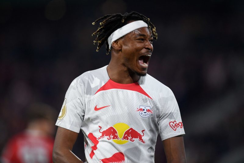 Arsenal transfer news Leipzig's French defender Mohamed Simakan celebrates after the German Cup (DFB Pokal) semi-final football match SC Freiburg v RB Leipzig in Freiburg southern Germany on May 2, 2023.   (Photo by THOMAS KIENZLE/AFP via Getty Images)