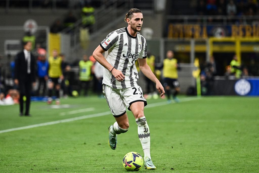 Juventus' French midfielder Adrien Rabiot runs with the ball during the Italian Cup semi-final second leg football match between Inter Milan and Juventus at the Giuseppe-Meazza (San Siro) stadium in Milan, on April 26, 2023. (Photo by Isabella BONOTTO / AFP) (Photo by ISABELLA BONOTTO/AFP via Getty Images)