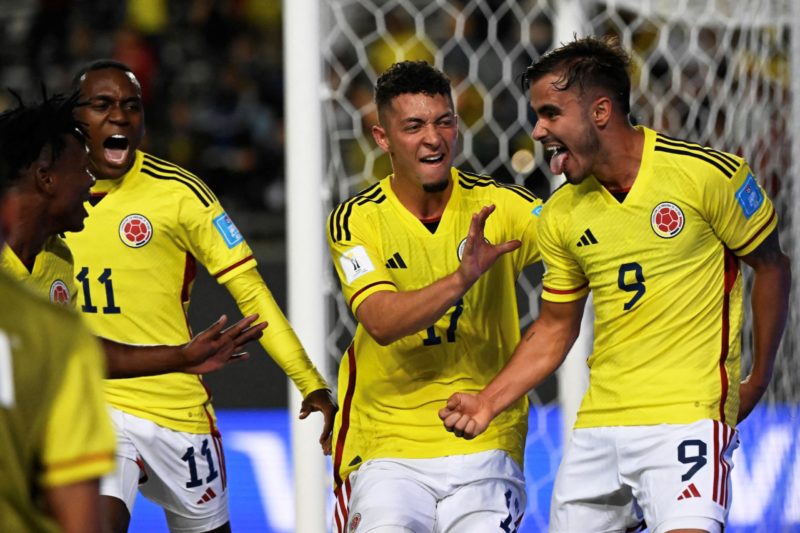Colombia's forward Tomas Angel (R) celebrates with teammates after scoring during the Argentina 2023 U-20 World Cup Group C football match between Japon and Colombia at the Diego Armando Maradona stadium in La Plata, Argentina, on May 24, 2023. (Photo by LUIS ROBAYO/AFP via Getty Images)