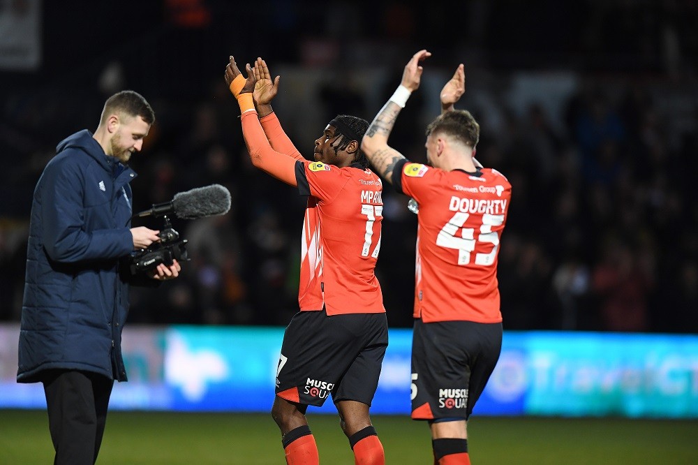 LUTON, ENGLAND: Pelly-Ruddock Mpanzu of Luton Town celebrates their win at the final whistle during the Sky Bet Championship match between Luton Town and Stoke City at Kenilworth Road on February 04, 2023. (Photo by Tony Marshall/Getty Images)