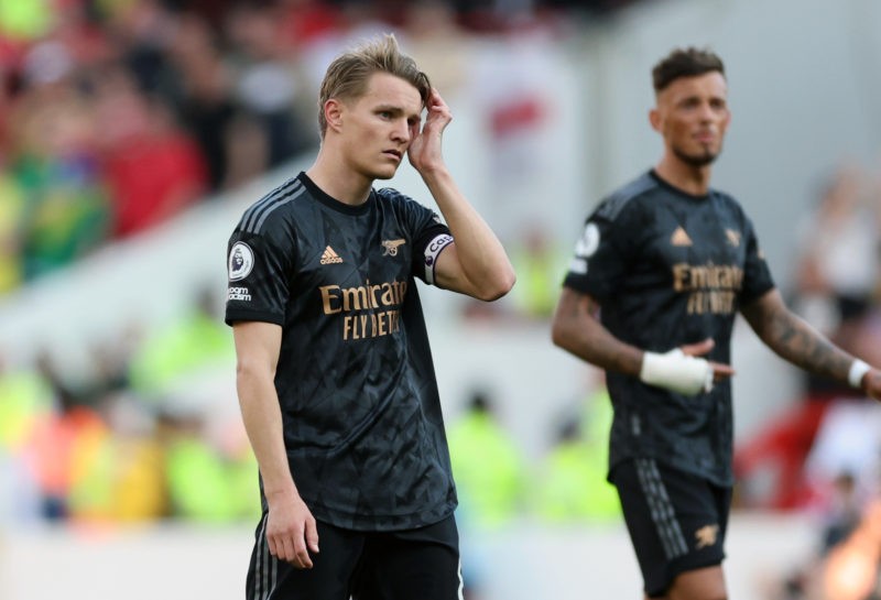 NOTTINGHAM, ENGLAND - MAY 20: Martin Odegaard of Arsenal stands dejected during the Premier League match between Nottingham Forest and Arsenal FC at City Ground on May 20, 2023 in Nottingham, England. (Photo by Catherine Ivill/Getty Images)