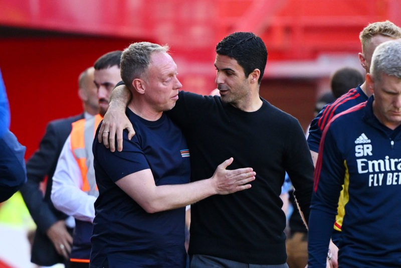 NOTTINGHAM, ENGLAND - MAY 20: Steve Cooper, Manager of Nottingham Forest, embraces Mikel Arteta, Manager of Arsenal, prior to the Premier League match between Nottingham Forest and Arsenal FC at City Ground on May 20, 2023 in Nottingham, England. (Photo by Clive Mason/Getty Images)