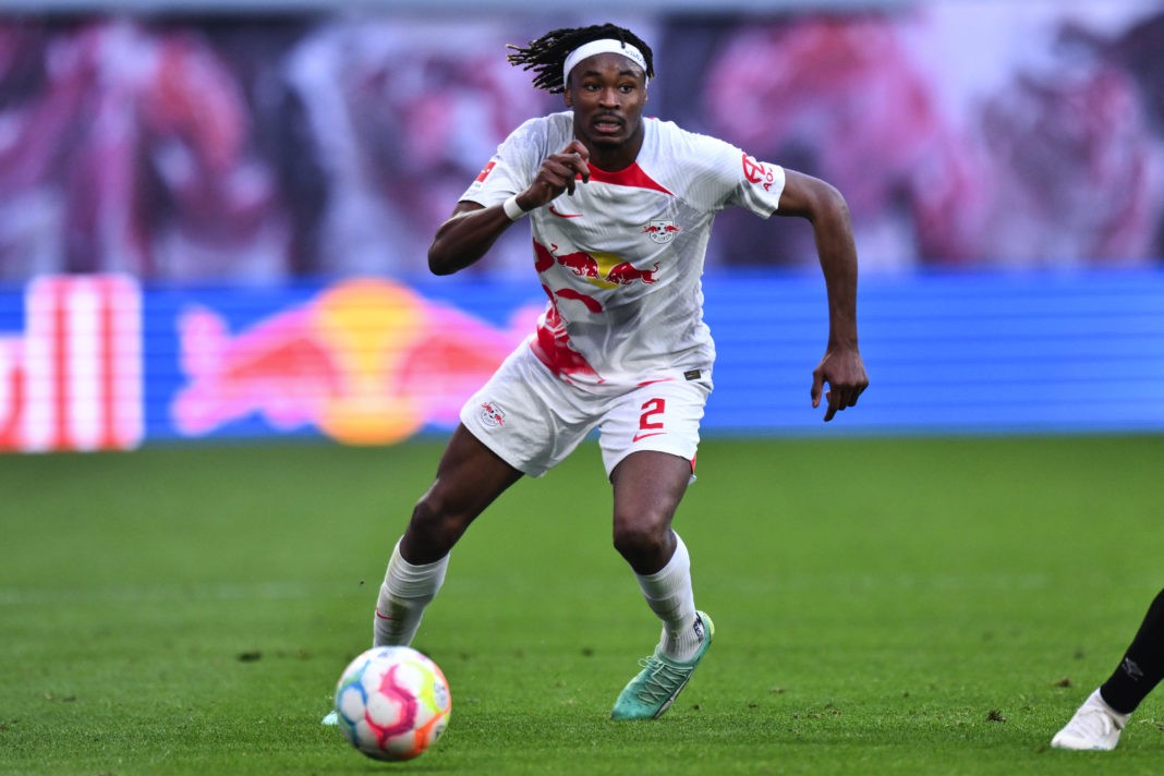 LEIPZIG, GERMANY - MAY 14: Mohamed Simakan of RB Leipzig runs with the ball during the Bundesliga match between RB Leipzig and SV Werder Bremen at Red Bull Arena on May 14, 2023 in Leipzig, Germany. (Photo by Oliver Hardt/Getty Images)