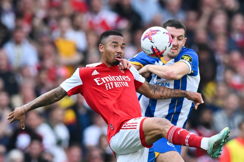 TOPSHOT - Arsenal's Brazilian striker Gabriel Jesus (L) fights for the ball with Brighton's English defender Lewis Dunk during the English Premier League football match between Arsenal and Brighton and Hove Albion at the Emirates Stadium in London on May 14, 2023. (Photo by GLYN KIRK/AFP via Getty Images)