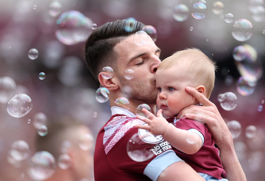 Declan Rice Arsenal transfers - LONDON, ENGLAND - MAY 21: Declan Rice of West Ham United takes to the field with a child prior to the Premier League match between West Ham United and Leeds United at London Stadium on May 21, 2023 in London, England. (Photo by Julian Finney/Getty Images)