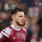 LONDON, ENGLAND - APRIL 26: Declan Rice of West Ham United looks on as they walk out of the tunnel prior to the Premier League match between West Ham United and Liverpool FC at London Stadium on April 26, 2023 in London, England. (Photo by Julian Finney/Getty Images)