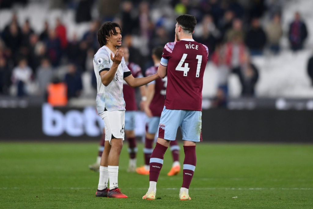 LONDON, ENGLAND - APRIL 26: Trent Alexander-Arnold of Liverpool speaks with Declan Rice of West Ham United after the Premier League match between West Ham United and Liverpool FC at London Stadium on April 26, 2023 in London, England. (Photo by Justin Setterfield/Getty Images)