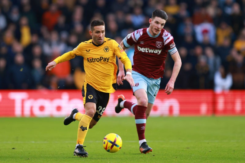 Arsenal vs Wolves - WOLVERHAMPTON, ENGLAND - JANUARY 14:  Joao Moutinho of Wolverhampton Wanderers in action with Declan Rice of West Ham  the Premier League match between Wolverhampton Wanderers and West Ham United at Molineux on January 14, 2023 in Wolverhampton, United Kingdom. (Photo by Marc Atkins/Getty Images)