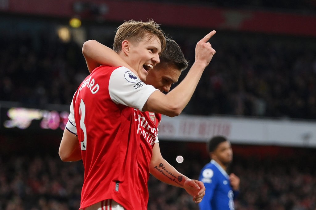 LONDON, ENGLAND - MAY 02: Martin Odegaard of Arsenal celebrates with teammate Leandro Trossard after scoring the team's second goal during the Premier League match between Arsenal FC and Chelsea FC at Emirates Stadium on May 02, 2023 in London, England. (Photo by Shaun Botterill/Getty Images)