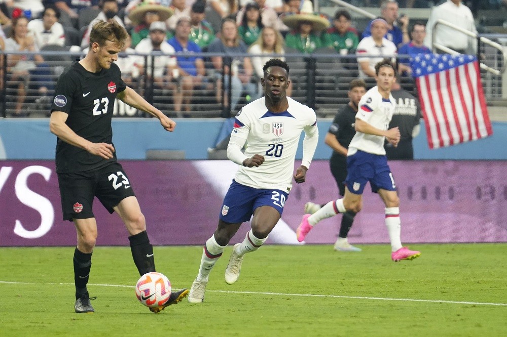 LAS VEGAS, NEVADA: Scott Kennedy of Canada and Folarin Balogun of the United States battle for the ball in the first half during the 2023 CONCACAF Nations League final at Allegiant Stadium on June 18, 2023. (Photo by Louis Grasse/Getty Images)