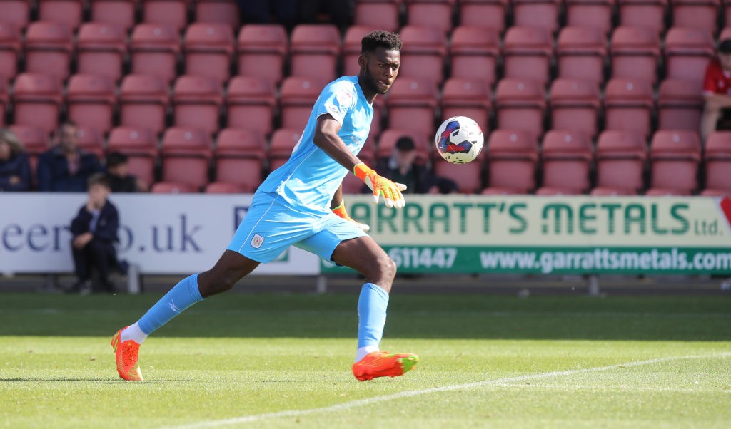 CREWE, ENGLAND - AUGUST 20: Arthur Okonkwo of Crewe Alexandra in action during the Sky Bet League Two between Crewe Alexandra and Northampton Town at Mornflake Stadium on August 20, 2022 in Crewe, England. (Photo by Pete Norton/Getty Images)