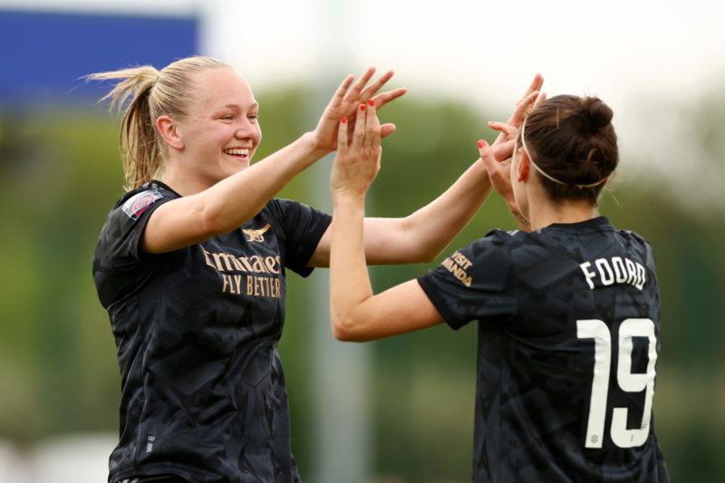 LIVERPOOL, ENGLAND - MAY 17: Caitlin Foord celebrates with teammate Frida Maanum of Arsenal after scoring the team's first goal during the FA Women's Super League match between Everton FC and Arsenal at Walton Hall Park on May 17, 2023 in Liverpool, England. (Photo by Naomi Baker/Getty Images)