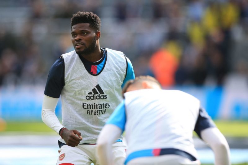 Arsenal's Ghanaian midfielder Thomas Partey warms up prior to the English Premier League football match between Newcastle United and Arsenal at St James' Park in Newcastle-upon-Tyne, north east England on May 7, 2023. (Photo by LINDSEY PARNABY/AFP via Getty Images)
