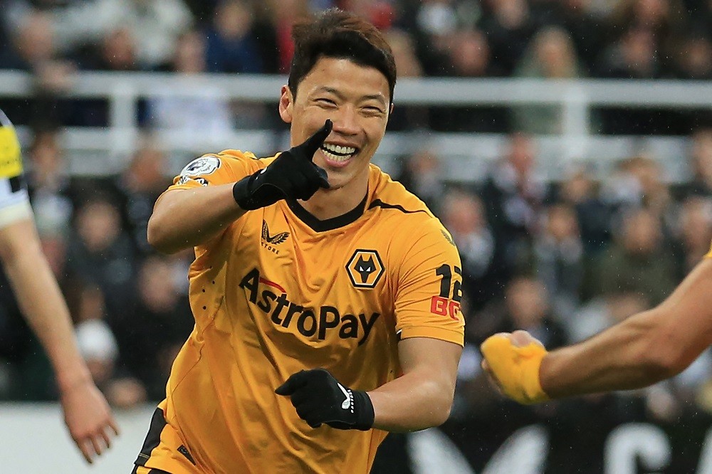 Wolverhampton Wanderers' South Korean striker Hwang Hee-chan celebrates after scoring their first goal during the English Premier League football match between Newcastle United and Wolverhampton Wanderers at St James' Park in Newcastle-upon-Tyne, north-east England on March 12, 2023. (Photo by LINDSEY PARNABY/AFP via Getty Images)