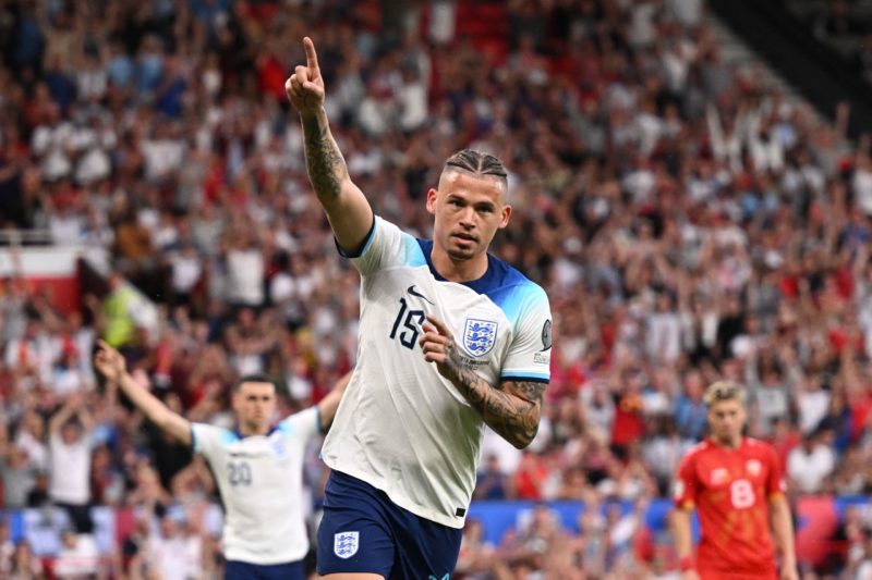 England's midfielder Kalvin Phillips celebrates after scoring their sixth goal during the UEFA Euro 2024 group C qualification football match between England and North Macedonia at Old Trafford in Manchester, north west England, on June 19, 2023. (Photo by Oli SCARFF / AFP) / NOT FOR MARKETING OR ADVERTISING USE / RESTRICTED TO EDITORIAL USE (Photo by OLI SCARFF/AFP via Getty Images)