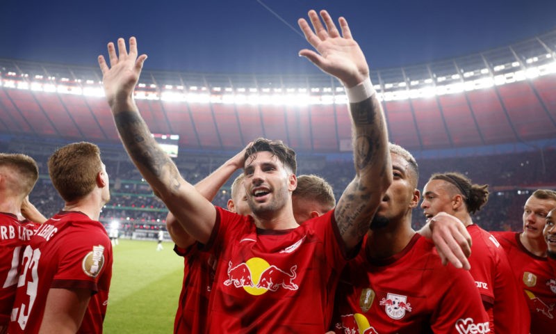  Leipzig's Hungarian midfielder Dominik Szoboszlai (C) celebrates with teammates after scoring the 2-0 goal during the German Cup (DFB Pokal) final football match RB Leipzig v Eintracht Frankfurt in Berlin, Germany, on June 3, 2023. (Photo by ODD ANDERSEN/AFP via Getty Images)