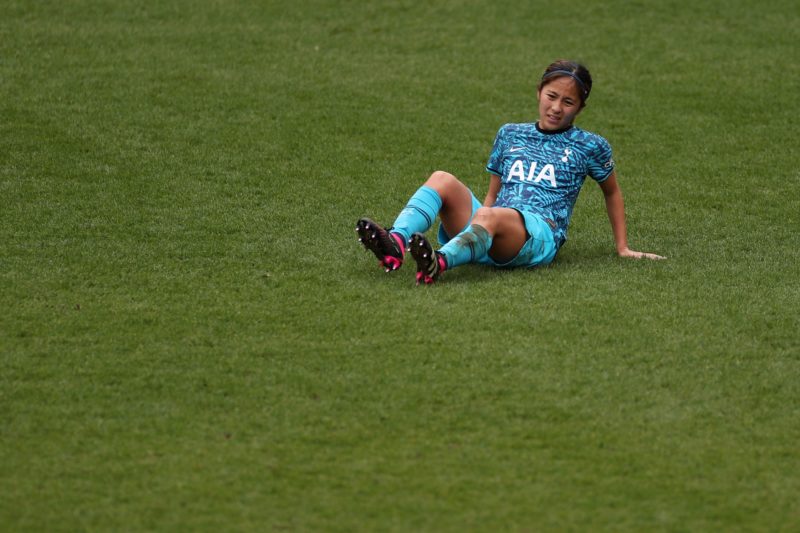 BIRKENHEAD, ENGLAND - MARCH 12: Mana Iwabuchi of Tottenham Hotspur reacts after picking up an injury before being substituted during the FA Women's Super League match between Liverpool and Tottenham Hotspur at Prenton Park on March 12, 2023 in Birkenhead, England. (Photo by Lewis Storey/Getty Images)