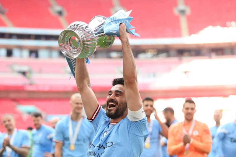 LONDON, ENGLAND - JUNE 03: Ilkay Guendogan of Manchester City celebrates with the FA Cup Trophy after the team's victory during the Emirates FA Cup Final between Manchester City and Manchester United at Wembley Stadium on June 03, 2023 in London, England. (Photo by Shaun Botterill/Getty Images)