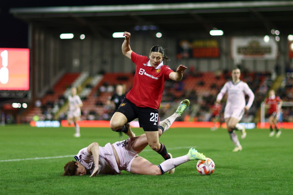 LEIGH, ENGLAND - APRIL 19: Rachel Williams of Manchester United battles for possession with Jennifer Beattie of Arsenal during the FA Women's Super League match between Manchester United and Arsenal at Leigh Sports Village on April 19, 2023 in Leigh, England. (Photo by Naomi Baker/Getty Images)