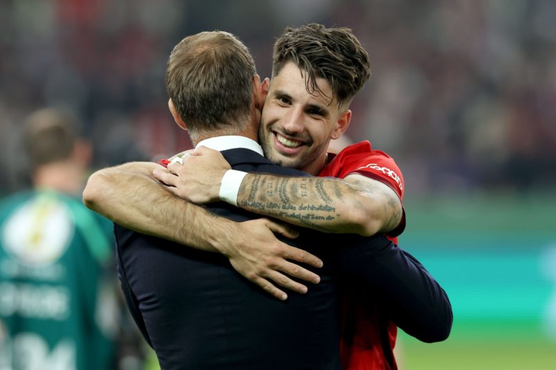 BERLIN, GERMANY - JUNE 03: Oliver Mintzlaff, CEO Corporate Projects and Investments of Red Bull celebrates with Leipzig Player Dominik Szoboszlai after winning the DFB Cup final match between RB Leipzig and Eintracht Frankfurt at Olympiastadion on June 03, 2023 in Berlin, Germany. (Photo by Alexander Hassenstein/Getty Images)
