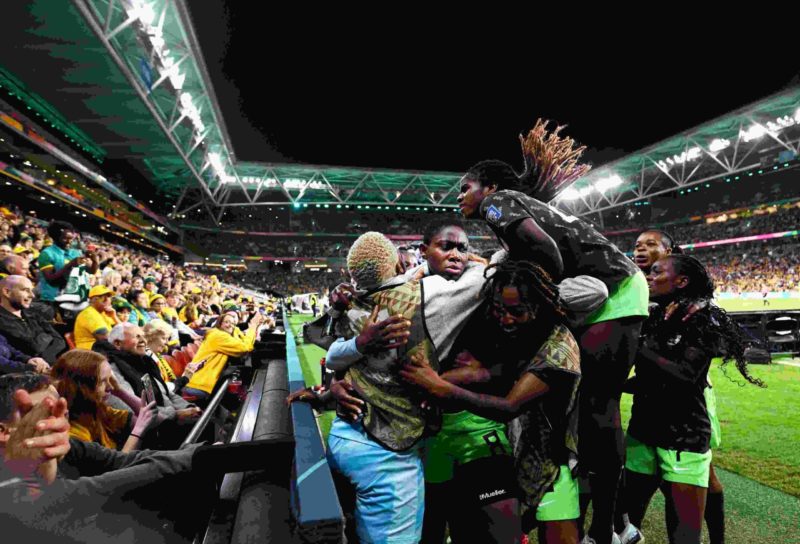 BRISBANE, AUSTRALIA - JULY 27: Asisat Oshoala (2nd L) of Nigeria celebrates with teammates after scoring her team's third goal during the FIFA Women's World Cup Australia & New Zealand 2023 Group B match between Australia and Nigeria at Brisbane Stadium on July 27, 2023 in Brisbane, Australia. (Photo by Justin Setterfield/Getty Images)
