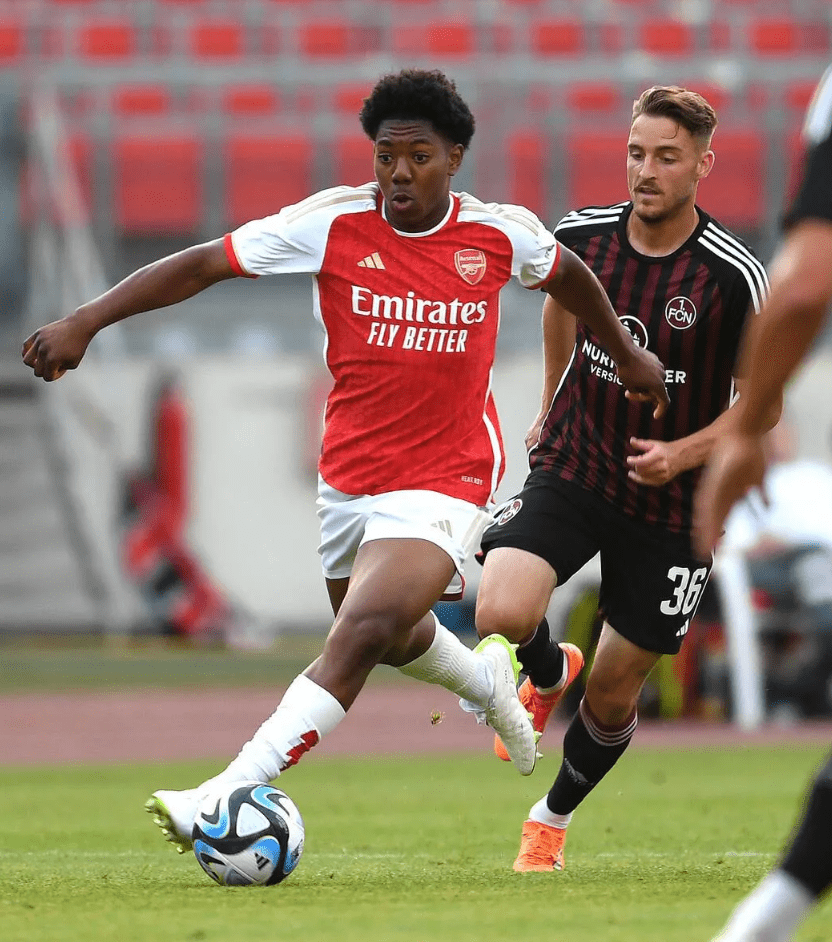 Myles Lewis-Skelly playing for Arsenal (Photo via Arsenal.com)