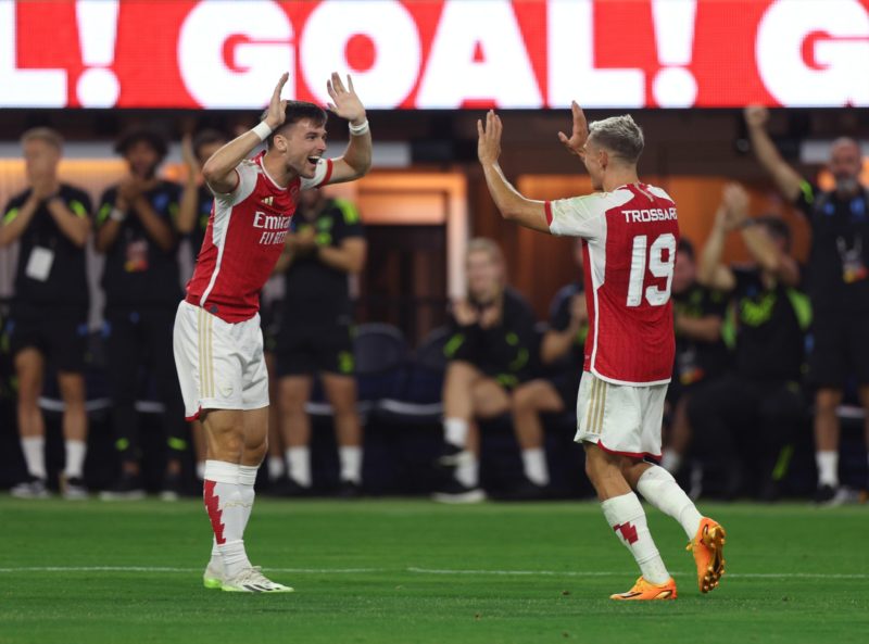INGLEWOOD, CALIFORNIA - JULY 26: Leandro Trossard #19 of Arsenal celebrates his goal with Kieran Tierney #3 for a 4-2 lead over FC Barcelona in a 5-3 Arsenal win during a pre-season friendly between Arsenal and FC Barcelona at SoFi Stadium on July 26, 2023 in Inglewood, California. (Photo by Harry How/Getty Images)