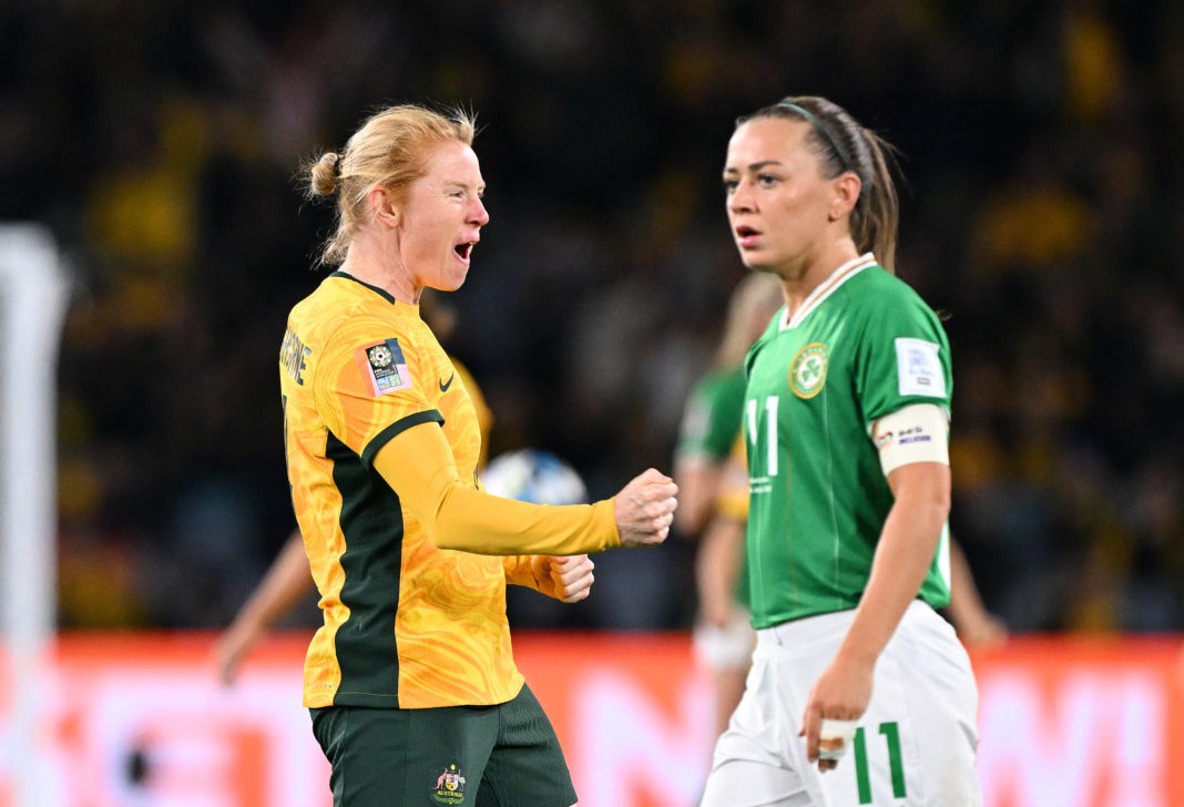 SYDNEY, AUSTRALIA - JULY 20: Clare Polkinghorne of Australia celebrates while Katie McCabe of Republic of Ireland shows dejection after the FIFA Women's World Cup Australia & New Zealand 2023 Group B match between Australia and Ireland at Stadium Australia on July 20, 2023 in Sydney, Australia. (Photo by Bradley Kanaris/Getty Images)