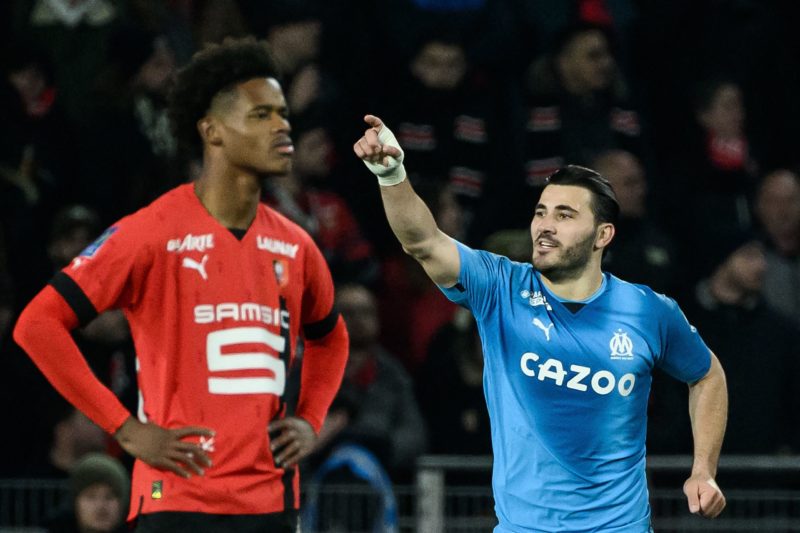 Marseille's Bosnian defender Sead Kolasinac (R) celebrates after scoring a goal during the French L1 football match between Stade Rennais and Olympique de Marseille at the Roazhon Park Stadium in Rennes, western France, on March 5, 2023. (Photo by LOIC VENANCE/AFP via Getty Images)