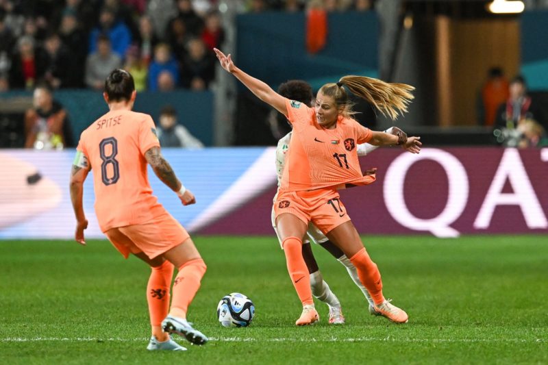 Portugal's forward #18 Carolina Mendes (back and Netherlands' midfielder #17 Victoria Pelova (R) fight for the ball during the Australia and New Zealand 2023 Women's World Cup Group E football match between the Netherlands and Portugal at Dunedin Stadium in Dunedin on July 23, 2023. (Photo by SANKA VIDANAGAMA/AFP via Getty Images)