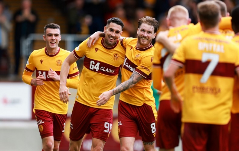 Conor Wilkinson goes to celebrate his goal with assist provider Mika Biereth (Photo via Motherwell)