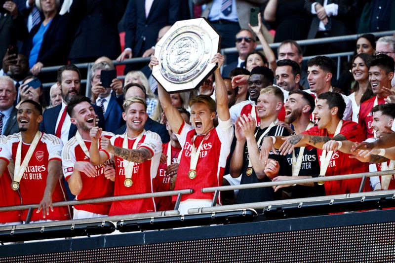 LONDON, ENGLAND - AUGUST 06: Martin Odegaard of Arsenal lifts the The FA Community Shield following The FA Community Shield match between Manchester City against Arsenal at Wembley Stadium on August 06, 2023 in London, England. (Photo by Mike Hewitt/Getty Images)