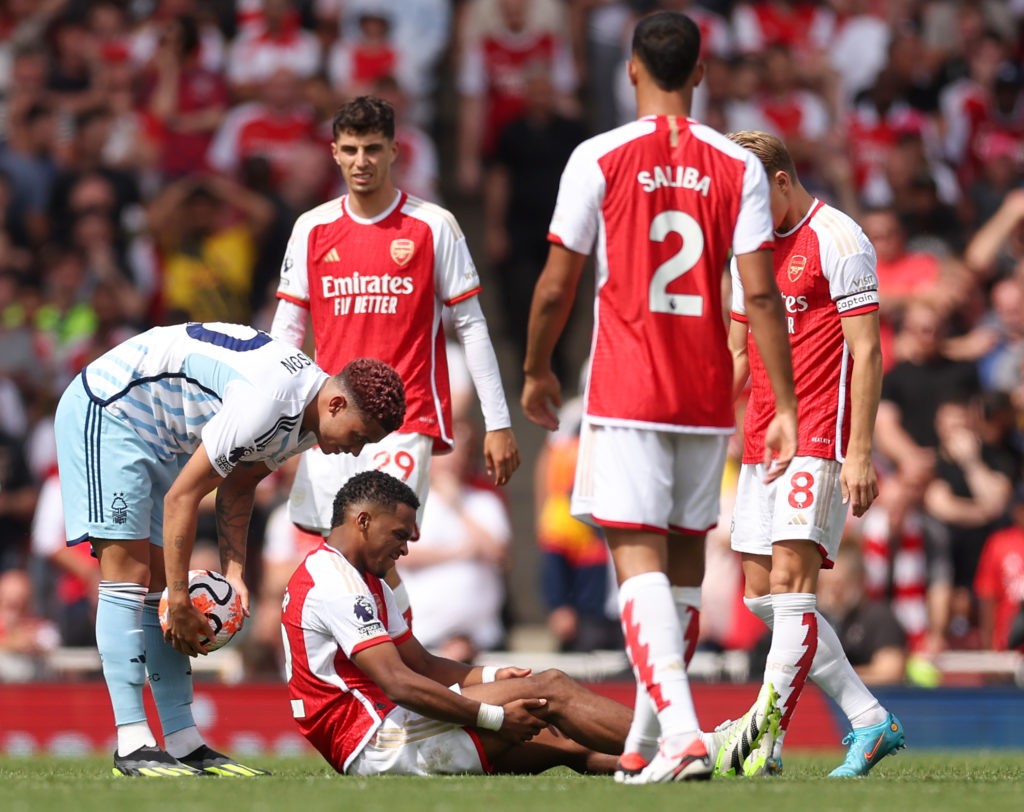LONDON, ENGLAND - AUGUST 12: Jurrien Timber of Arsenal goes down with an injury during the Premier League match between Arsenal FC and Nottingham Forest at Emirates Stadium on August 12, 2023 in London, England. (Photo by Julian Finney/Getty Images)