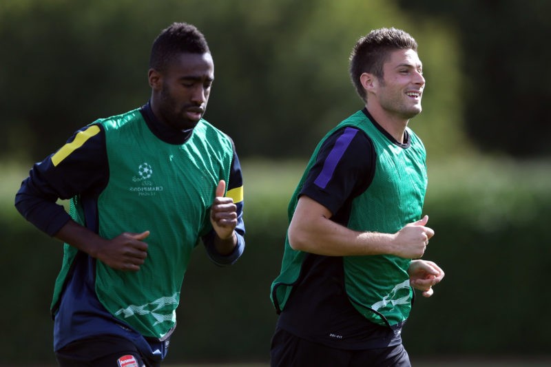 ST ALBANS, ENGLAND - SEPTEMBER 17: Olivier Giroud of Arsenal and Johan Djourou (L) of Arsenal during a training session at London Colney on September 17, 2012 in St Albans, England. (Photo by Julian Finney/Getty Images)
