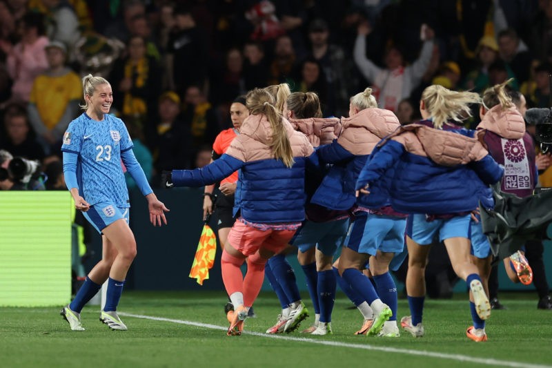 SYDNEY, AUSTRALIA - AUGUST 16: Alessia Russo of England celebrates after scoring her team's third goal with teammates during the FIFA Women's World Cup Australia & New Zealand 2023 Semi Final match between Australia and England at Stadium Australia on August 16, 2023 in Sydney, Australia. (Photo by Cameron Spencer/Getty Images)