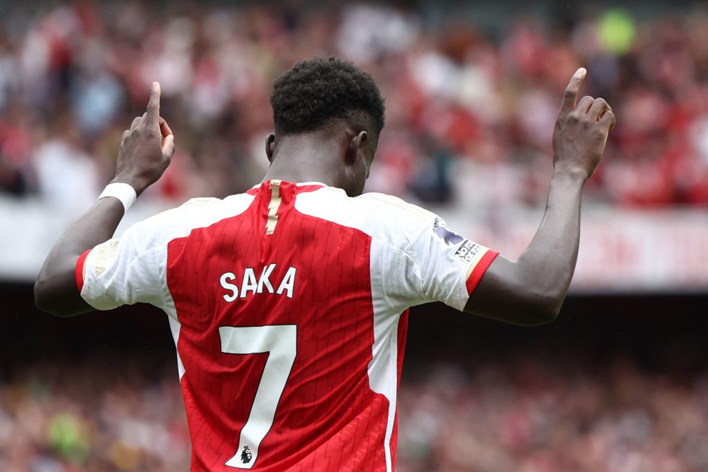 Arsenal's English midfielder #07 Bukayo Saka celebrates scoring the team's second goal during the English Premier League football match between Arsenal and Nottingham Forest at the Emirates Stadium in London on August 12, 2023. (Photo by HENRY NICHOLLS/AFP via Getty Images)