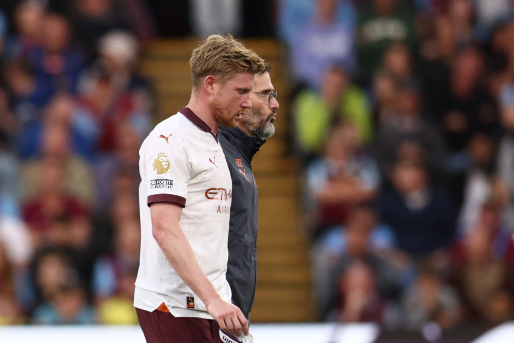 Manchester City's Belgian midfielder #17 Kevin De Bruyne reacts as he leaves the pitch following an injury during the English Premier League football match between Burnley and Manchester City at Turf Moor in Burnley, north-west England on August 11, 2023. (Photo by DARREN STAPLES/AFP via Getty Images)