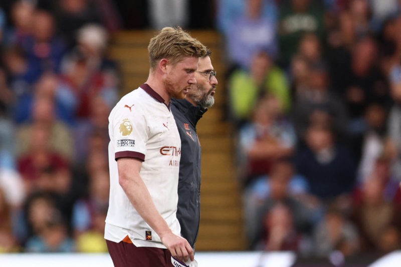 Manchester City's Belgian midfielder #17 Kevin De Bruyne reacts as he leaves the pitch following an injury during the English Premier League football match between Burnley and Manchester City at Turf Moor in Burnley, north-west England on August 11, 2023. (Photo by DARREN STAPLES/AFP via Getty Images)